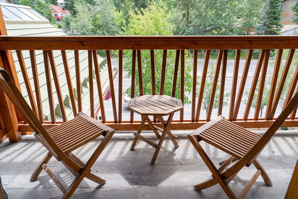 Enjoy a glass of wine on your spacious, private balcony while appreciating the alpenglow on the mountains.