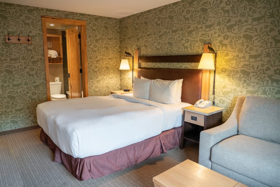 Sink back into this luxurious bed after a day spent in the Rockies.