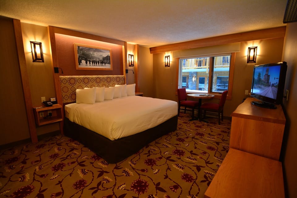 Get a sumptuous night sleep on the plush king-sized bed.