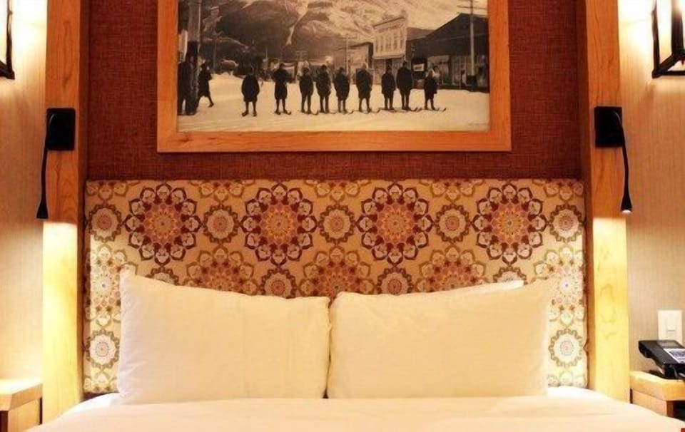 Drift to sleep in this sumptuous king-sized bed after a day playing around in the Rockies.
