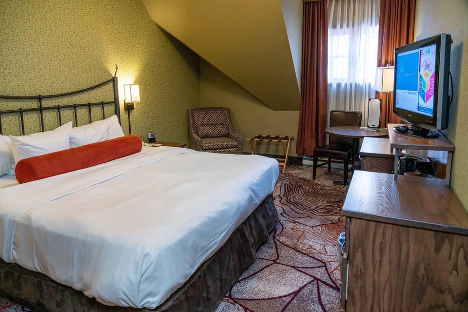 After a day on the town, come back to this cozy room and relax in the luxurious king-sized bed.