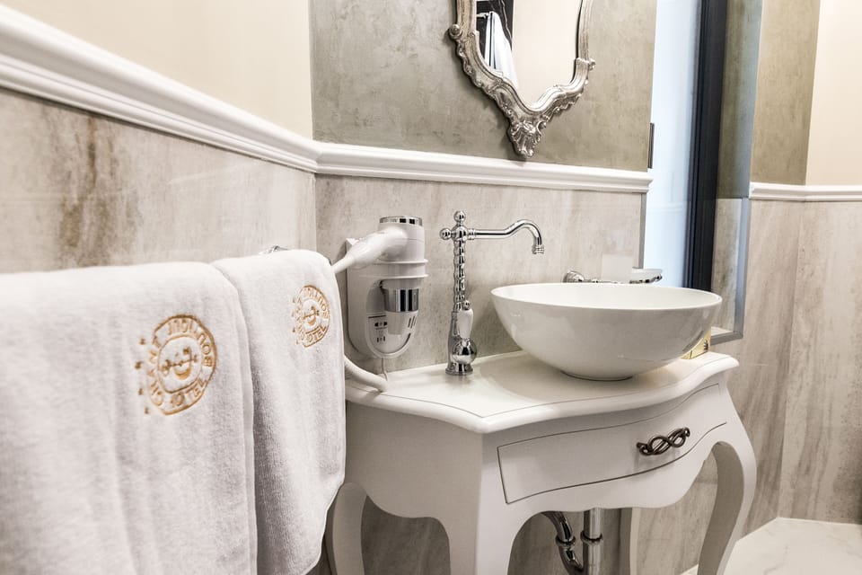 Basic Double Room | Bathroom | Free toiletries, hair dryer, bathrobes, slippers