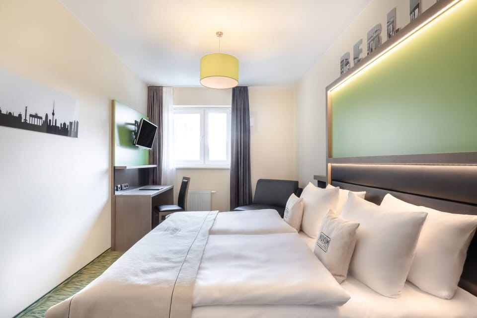 Hypo-allergenic bedding, in-room safe, desk, soundproofing