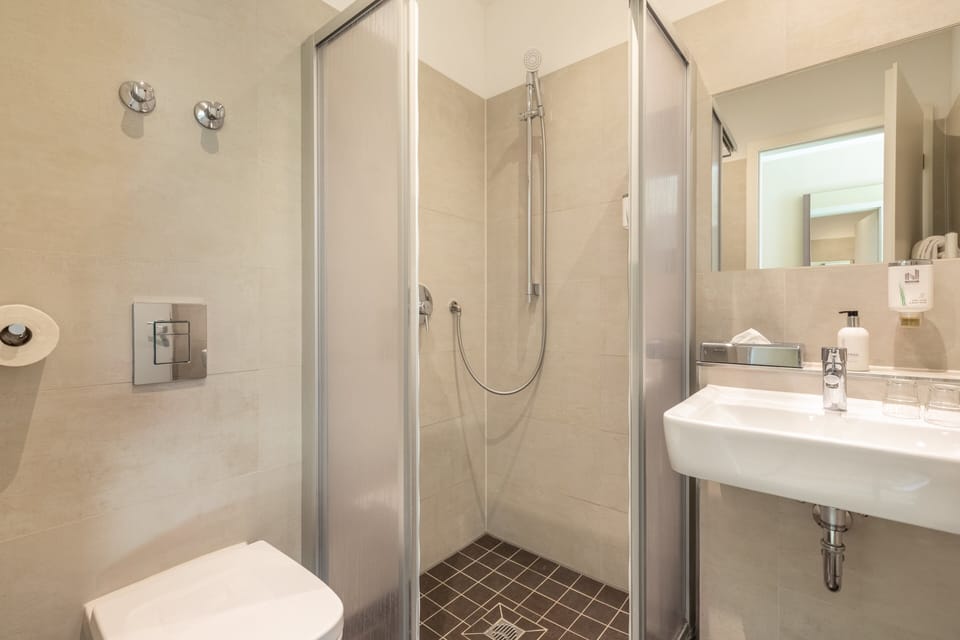 Shower, free toiletries, hair dryer, towels