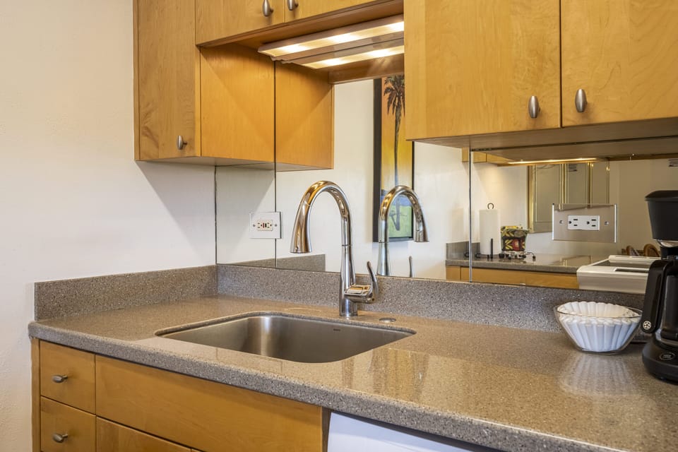 Maple cabinets in kitchen and bathrooms.