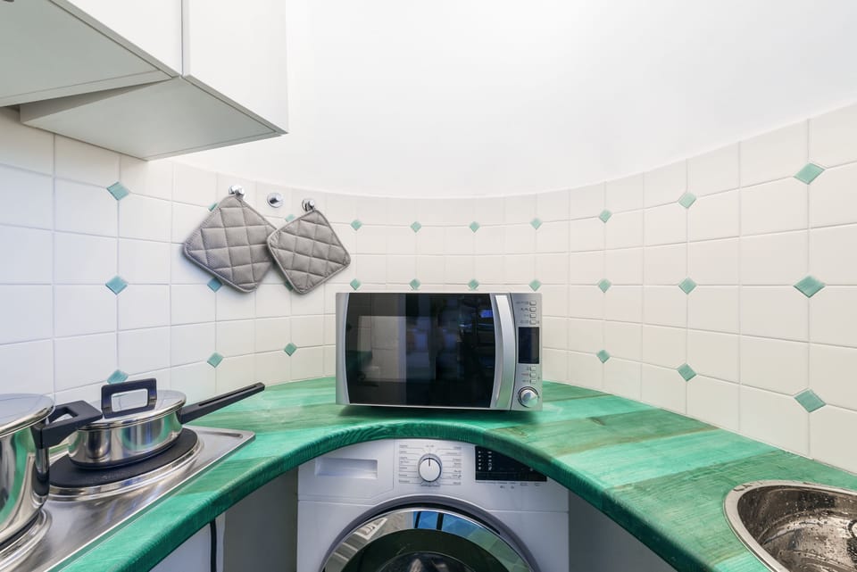 Apartment, 1 King Bed with Sofa bed, Sea View, Annex Building | Private kitchen | Shared fridge, microwave, electric kettle, highchair