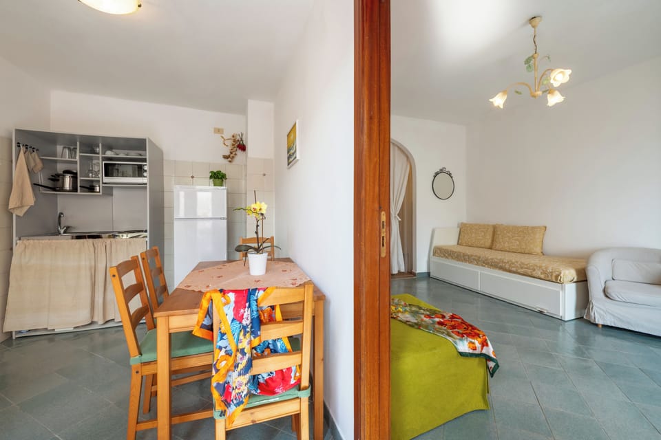 Standard Apartment, 1 Bedroom, Balcony, Partial Sea View | Private kitchenette | Shared fridge, microwave, electric kettle, highchair