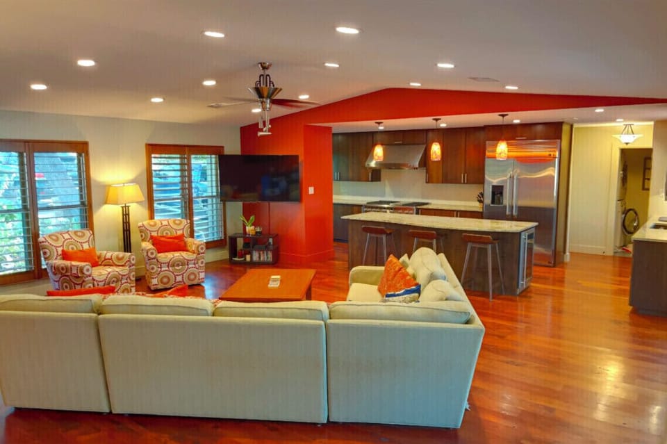 The living room opens up into a gourmet kitchen and laundry room.  