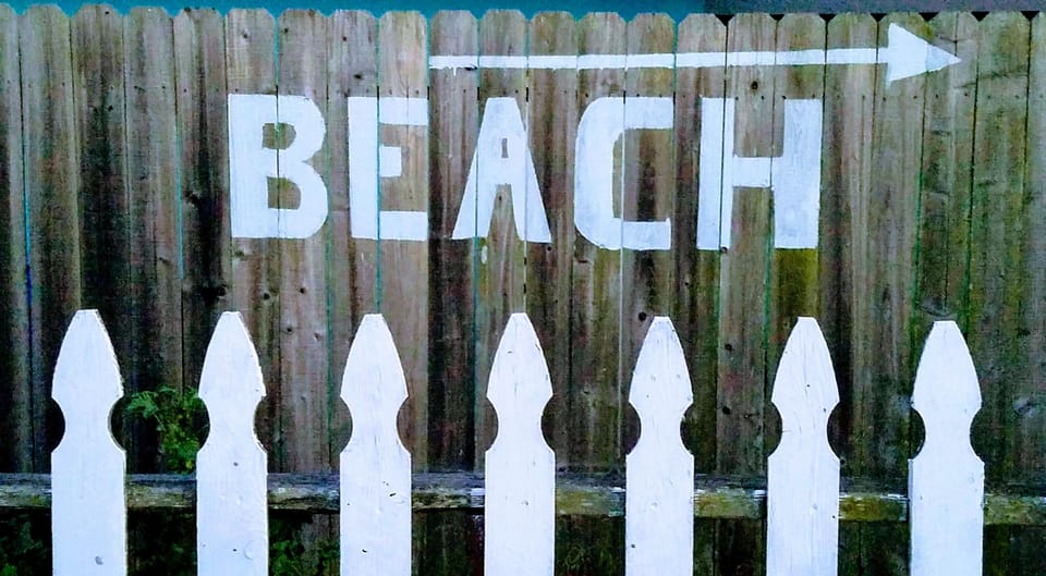 Beach less than a mile away!