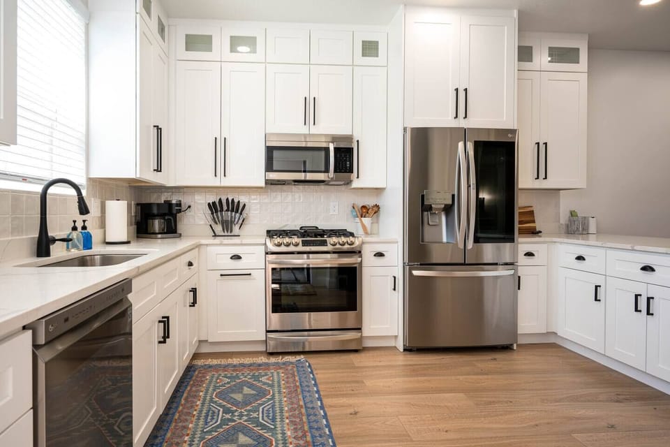 Cook your favorite meals in a kitchen bathed in natural light that enhance the culinary experience.