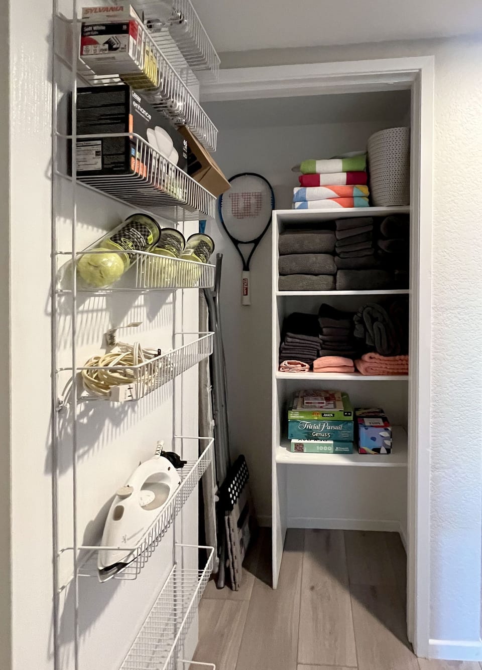 SUPPLY CLOSET - offers bath and beach towels, tennis racquets, iron, etc.