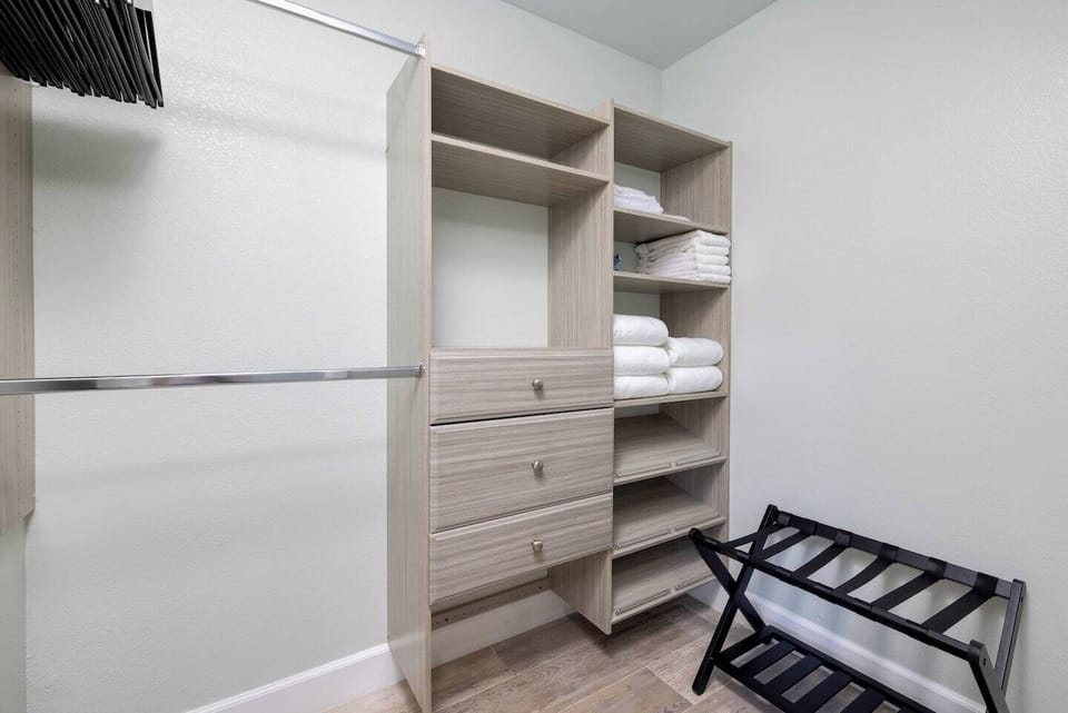 Master Walk in Closet with pleanty of storage for your things and shoes of course.