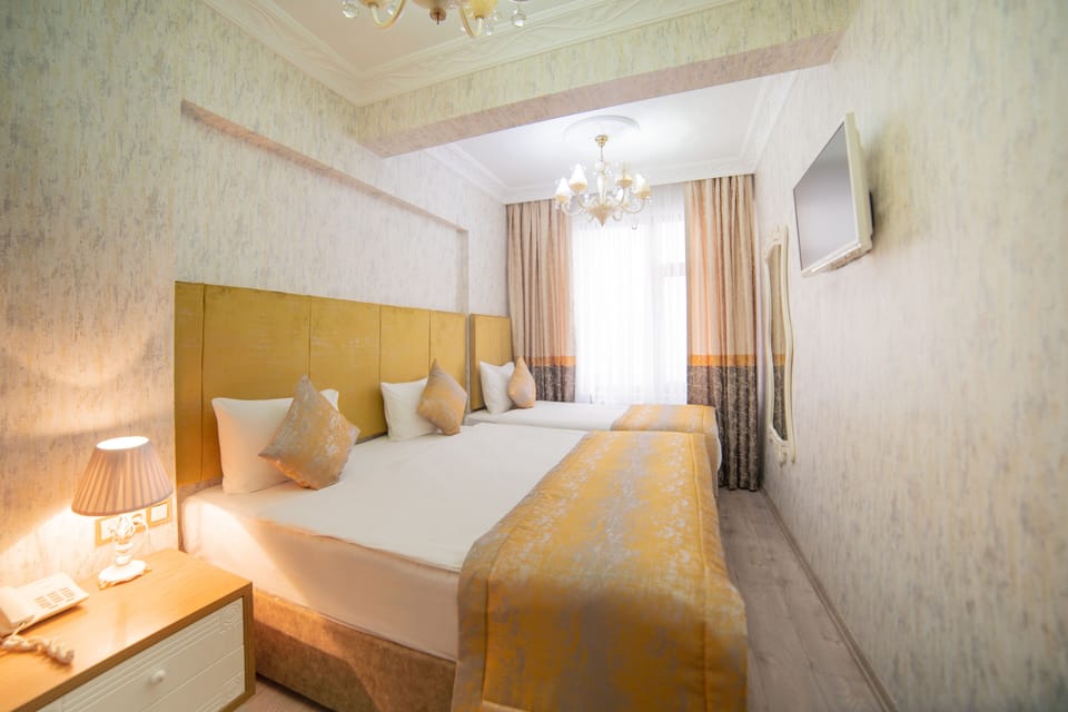 Premium bedding, free minibar, in-room safe, desk
