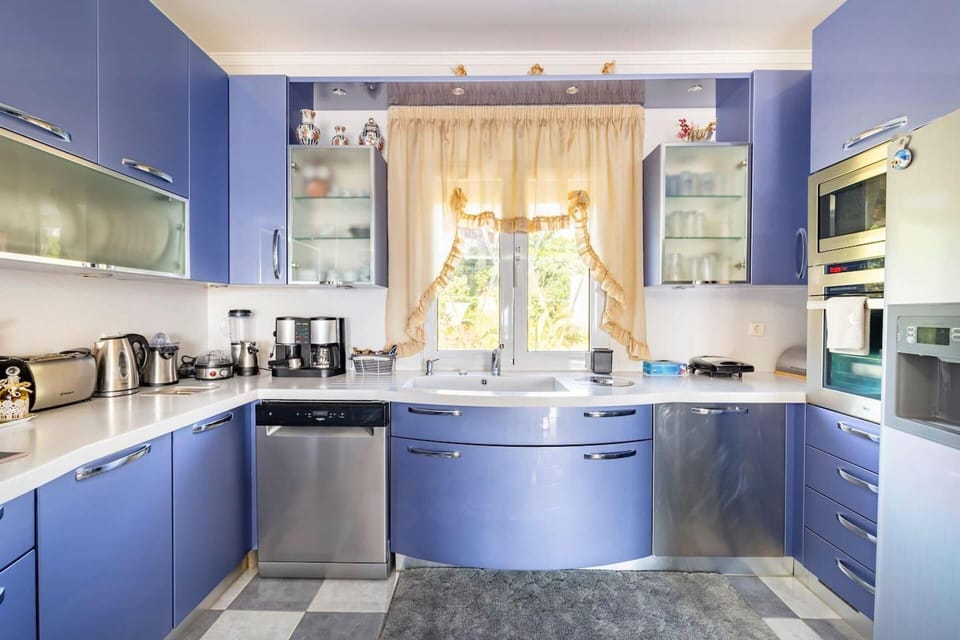 Villa | Private kitchen | Fridge, microwave, oven, stovetop