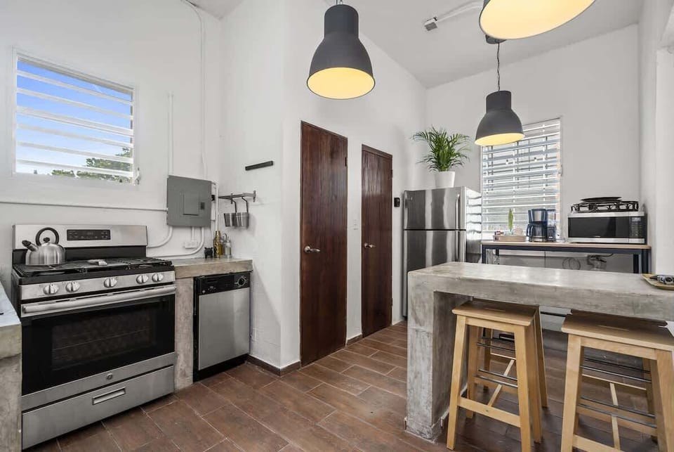 Our modern kitchen is a wonderful place to gather, prepare meals and share a laugh.