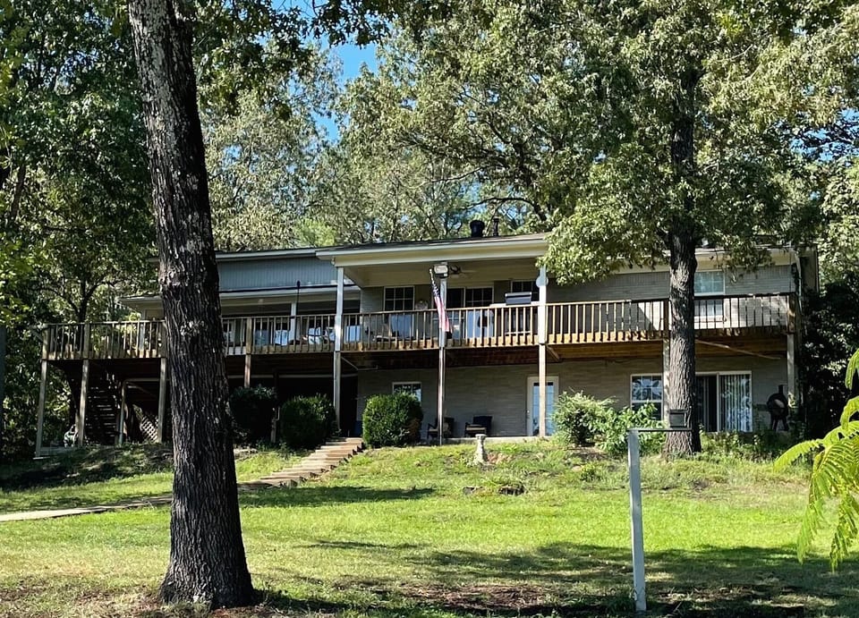 King's Port on Lake Hamilton, Main deck above, patio with hot tub below.