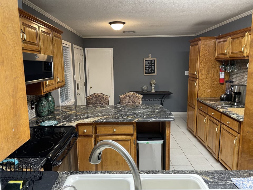 Kitchen has granite counters.