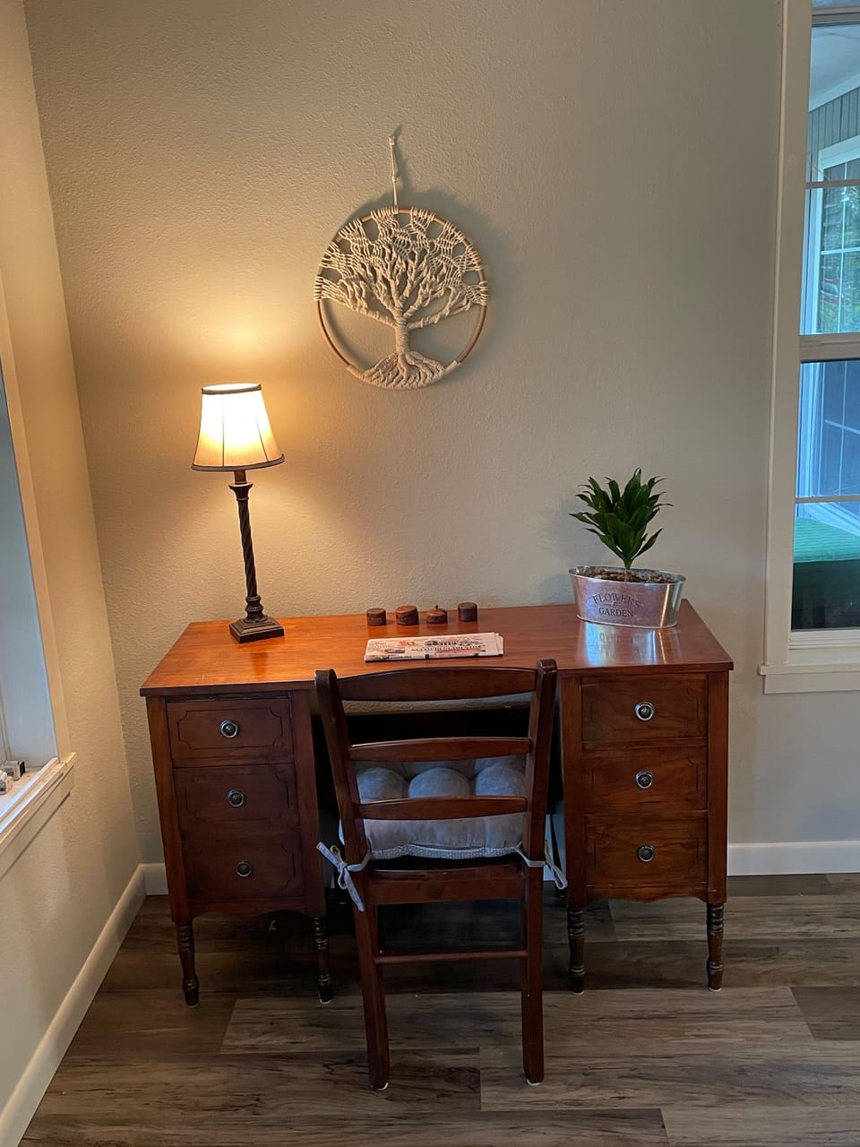 Desk in dining room with window view of the lake and main deck.
