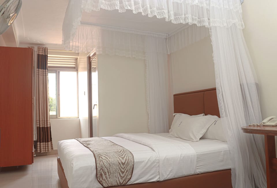 Deluxe Room, 1 Queen Bed | Free WiFi
