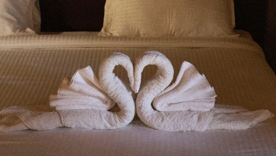 Deluxe Room | Premium bedding, minibar, desk, bed sheets