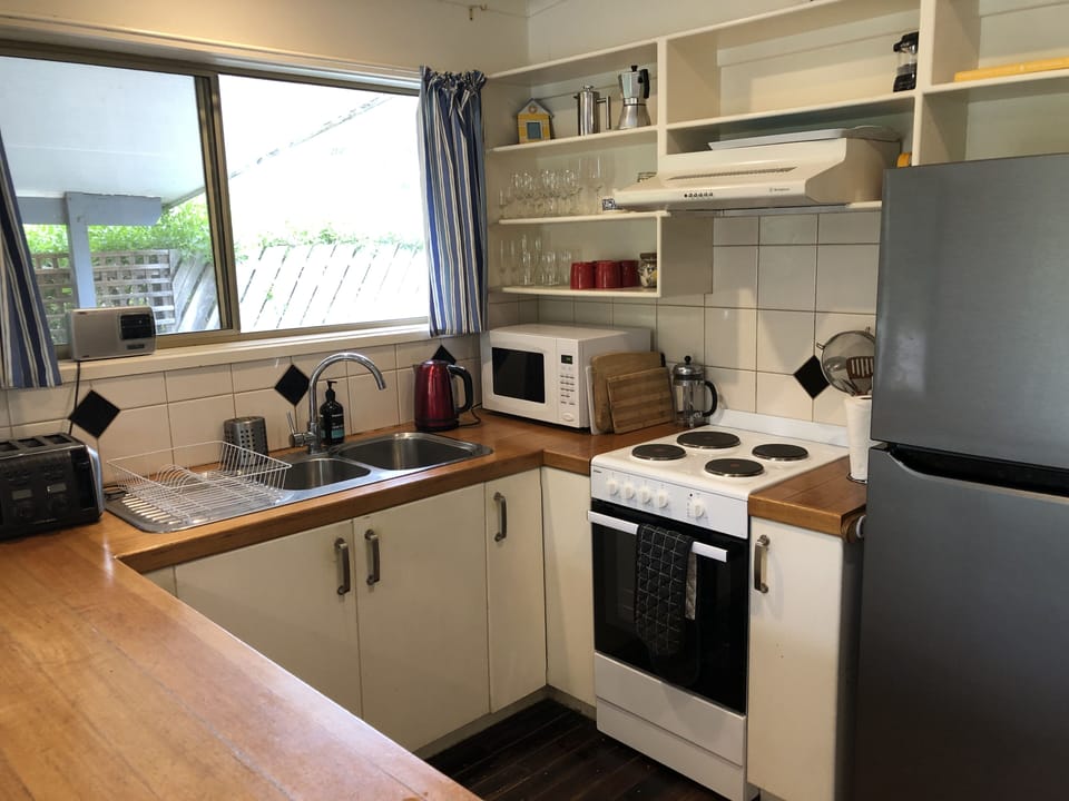 Beachwalk 3 Bedroom Cottage | Private kitchen | Full-size fridge, microwave, oven, stovetop