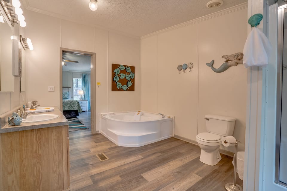 Master bath with jetted bathtub and a walk- in shower