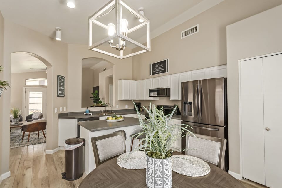 Well stocked kitchen with indoor and outdoor seating for your guests to gather