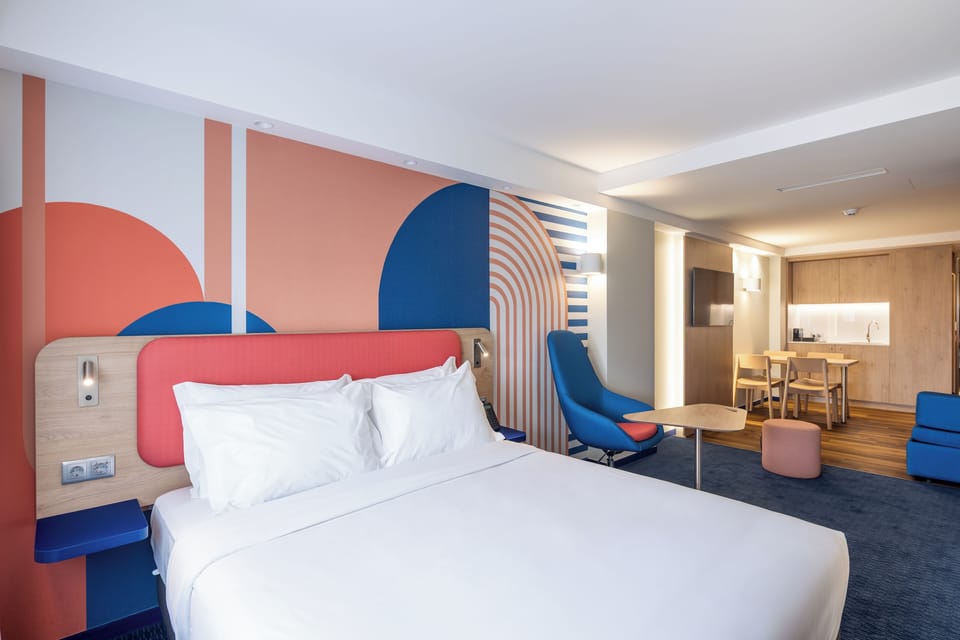 Suite, 1 Queen Bed, Balcony | Desk, iron/ironing board, WiFi (free), bed sheets