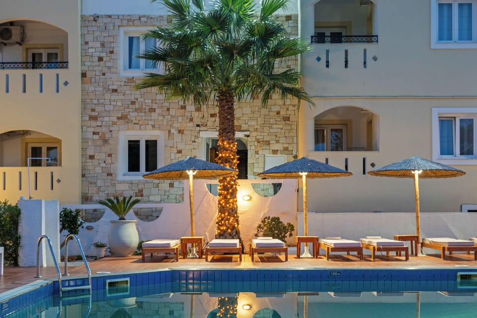 Seasonal outdoor pool, pool umbrellas, sun loungers