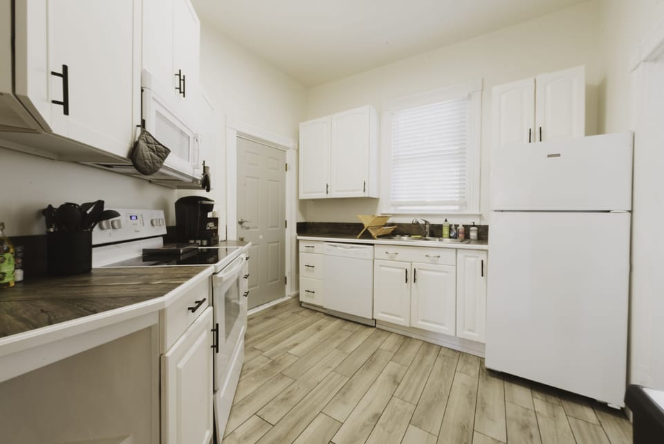 The upstairs kitchen is outfitted with all the basic essentials.