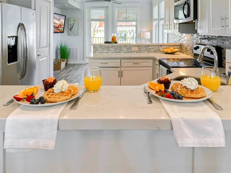 Each kitchen island bar has two additional seats.