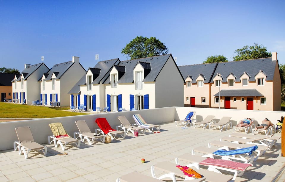 Take in the beautiful sun from the loungers on the patio.