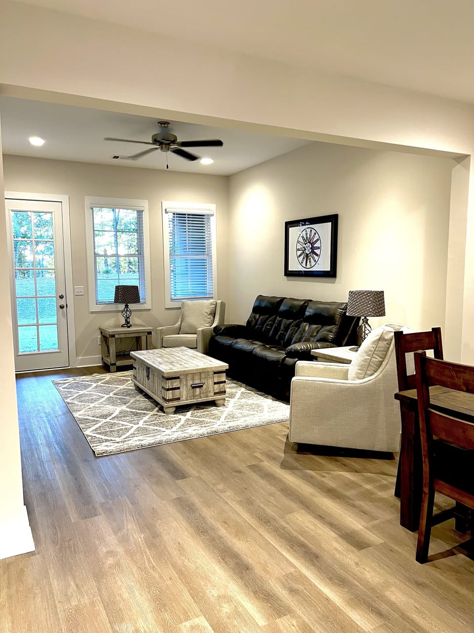 Living room with Large TV and charging stations in the side tables and couch