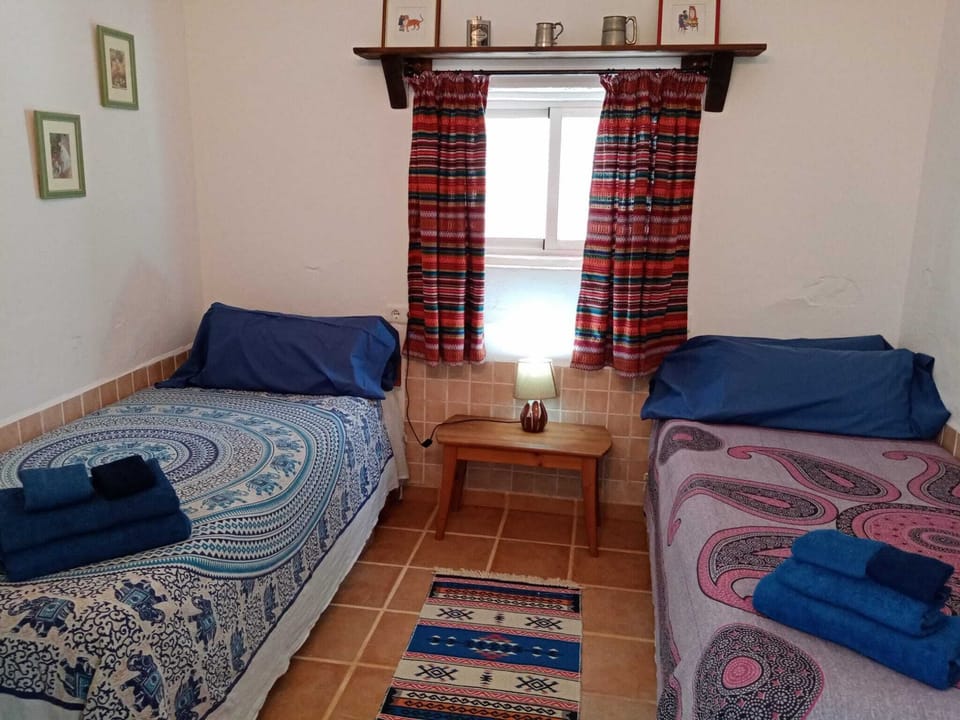 Two single beds, ensuite. Facilities for hanging and organising your clothes. 