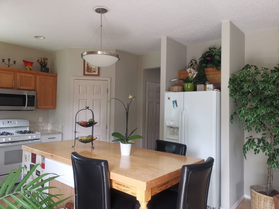 The kitchen has granite countertop and  pantry room.