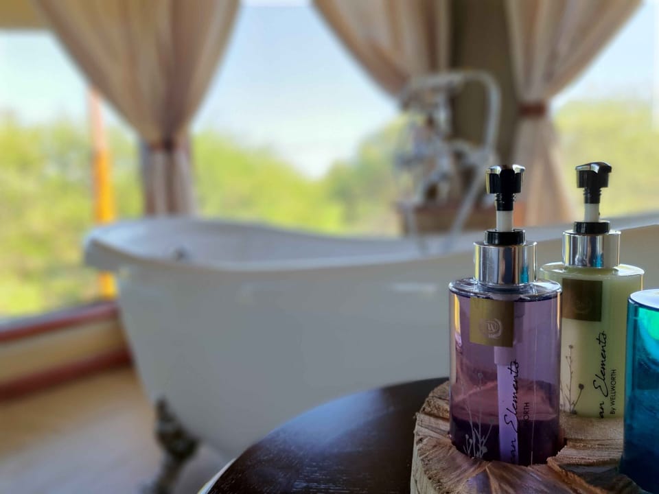 Luxury Tent | Bathroom | Slippers, towels, toilet paper
