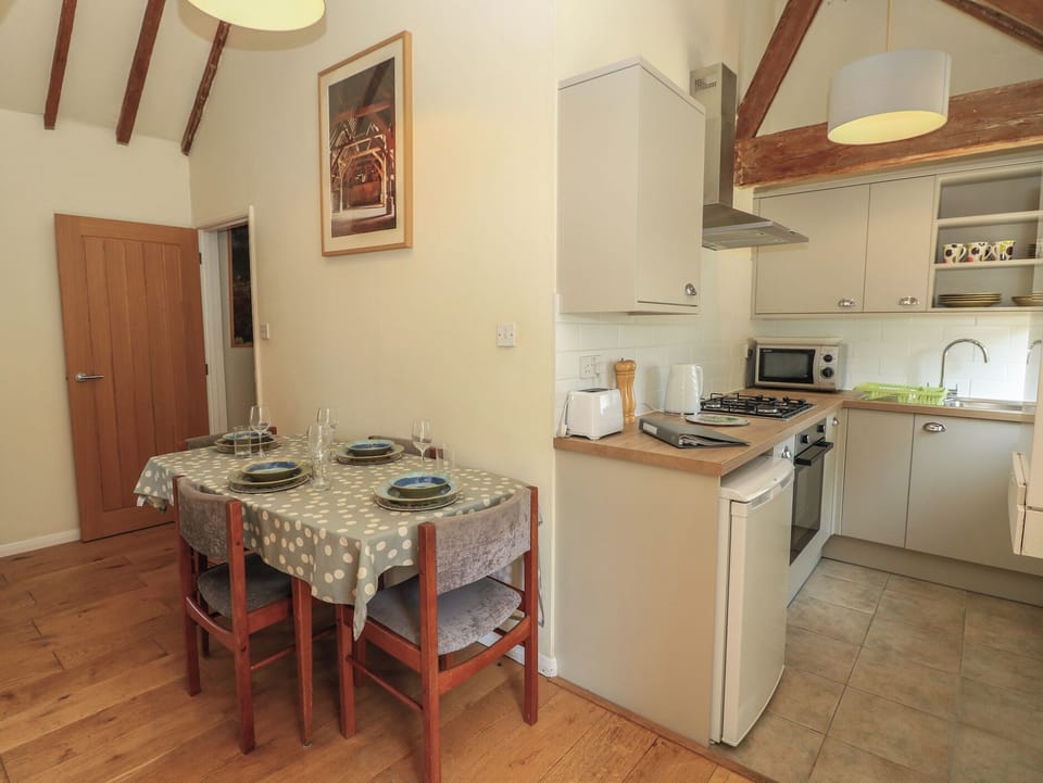 Fridge, electric kettle, toaster, cookware/dishes/utensils