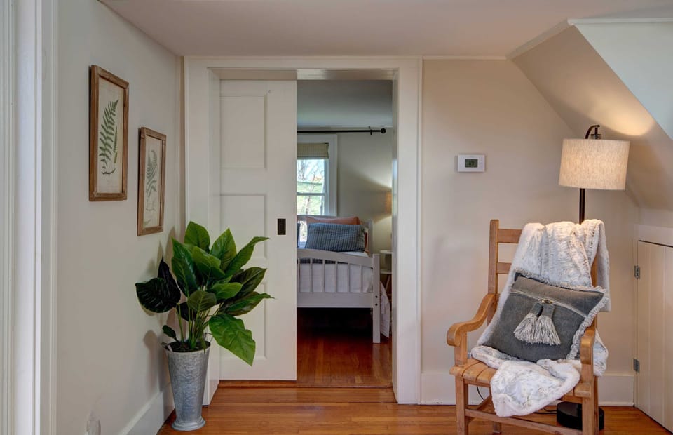 Main level primary bedroom door off front foyer