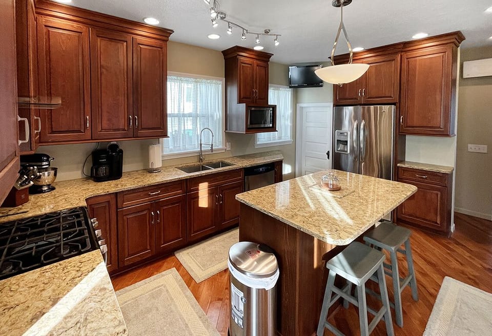 Large kitchen, microwave and dishwasher.