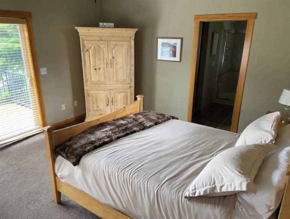 Master bedroom with private balcony and en suite bathroom