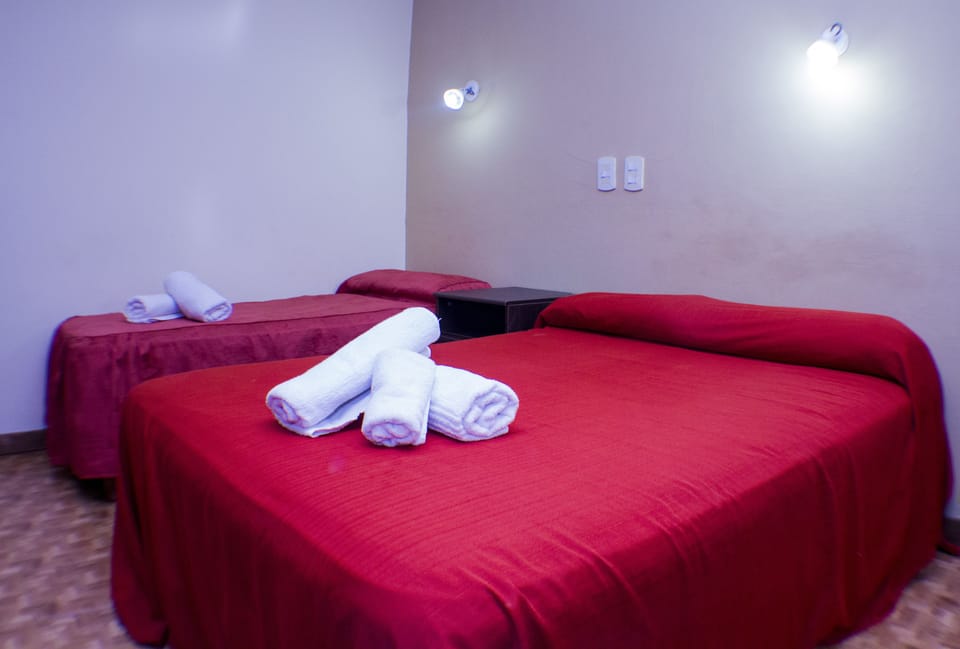 Triple Room | 1 bedroom, bed sheets