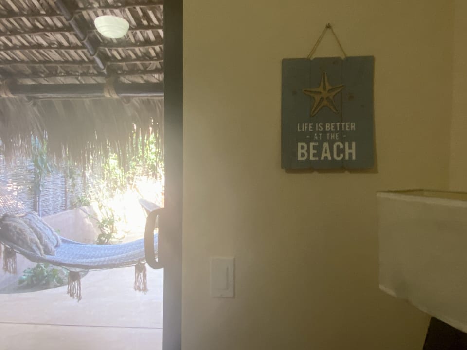 The downstairs bedroom with Queen bed opens onto the patio