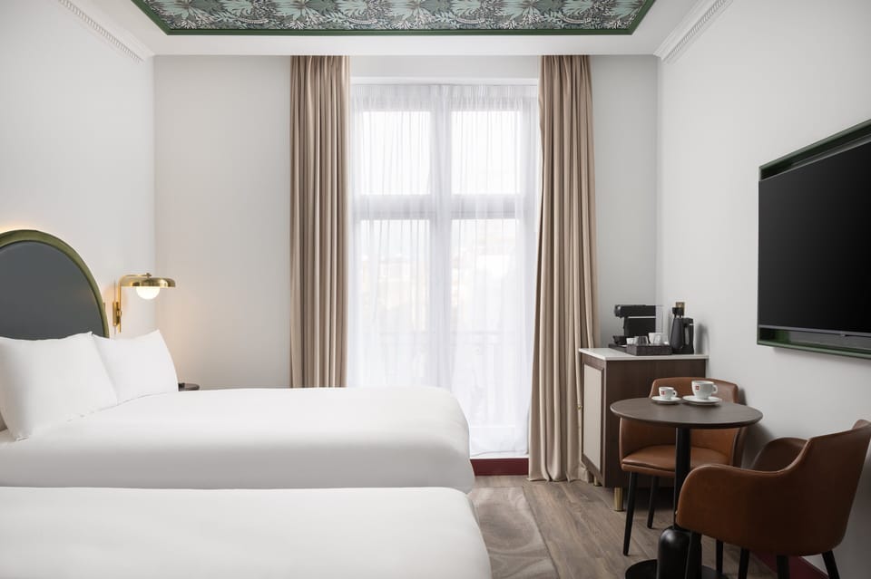 Grand Room, 2 Double Beds (Welbeck Street View) | Minibar, in-room safe, desk, laptop workspace