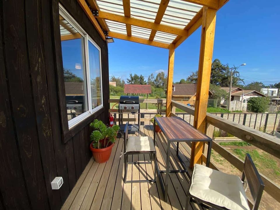 Private terrace w/ barbecue & outdoor seating overlooking the neighborhood