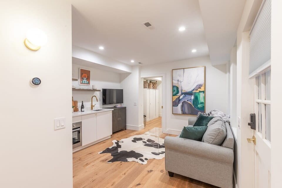 Open floor plan is perfect for unwinding together after seeing the sights! Sofa bed pulls out to reveal a queen sized bed