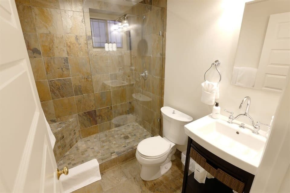 Glass enclosed walk in shower