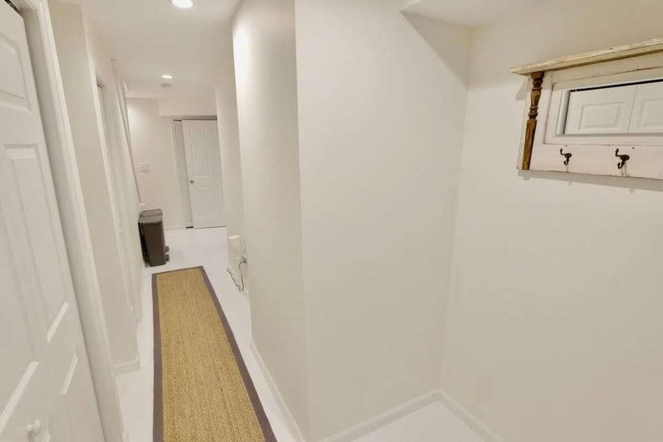 Hallway to the bedroom and bathroom
