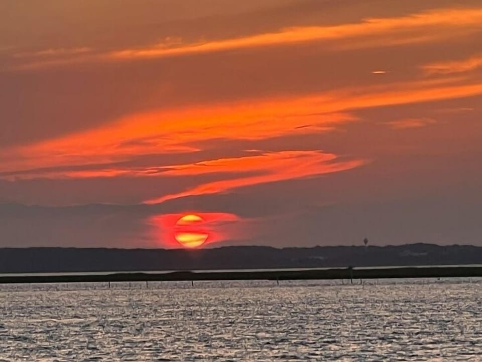 Unwind each evening with spectacular sunsets over the water.