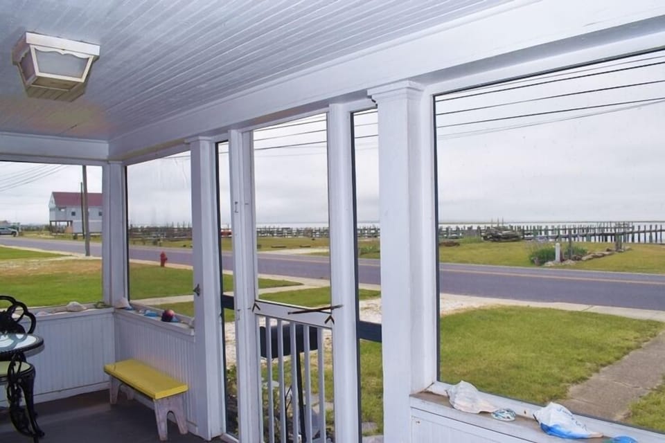 Take in the view on the screened in front porch