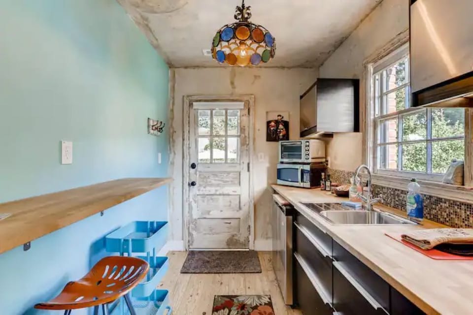 Kitchen with bar counter large enough for a laptop